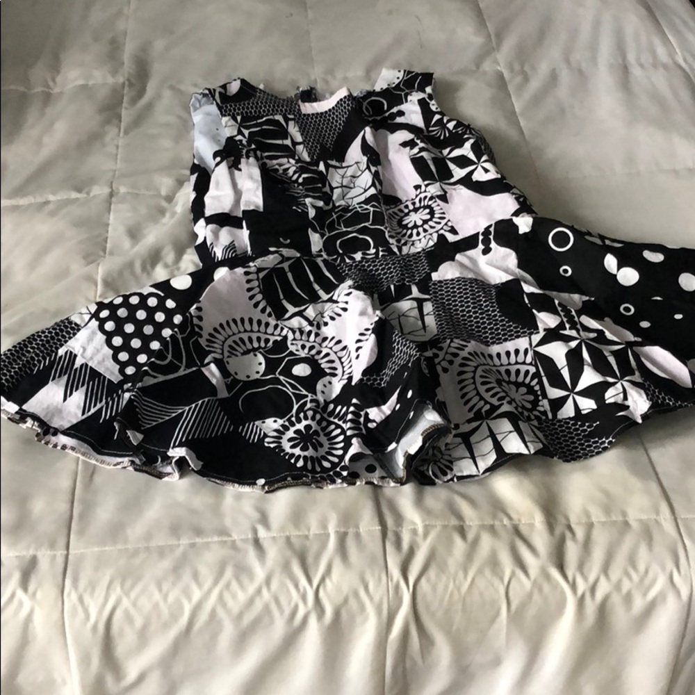 Custom made peplum top.